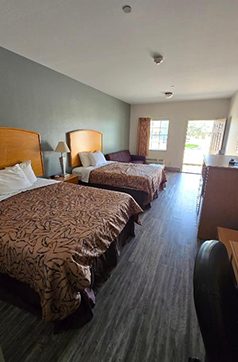 Comfortable Guest Room at Whitesboro Inn & Suites